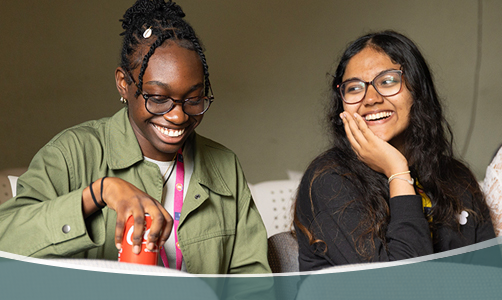 Student writing in class